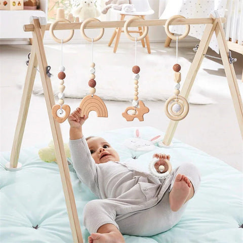 Baby-Nursery-Gymnastikspielzeug aus Holzperlen entzückenden hängenden Spielzeuge